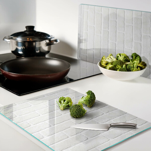 Glass chopping board Brick wall
