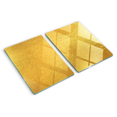 Chopping board glass Golden surface with reflections