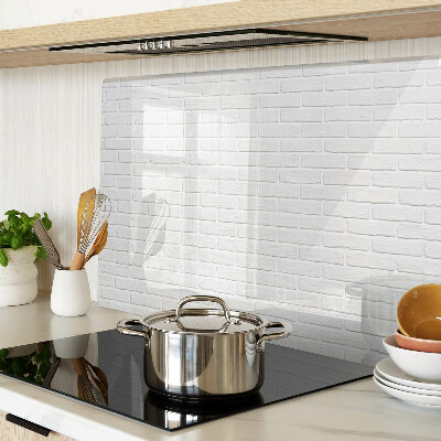 Glass chopping board Brick wall