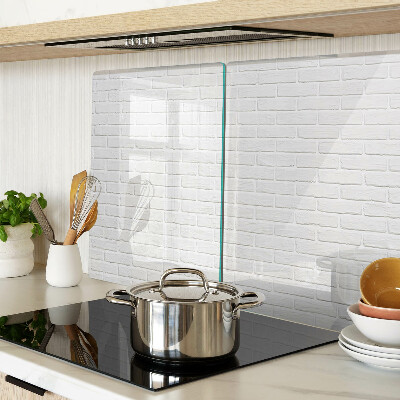 Glass chopping board Brick wall