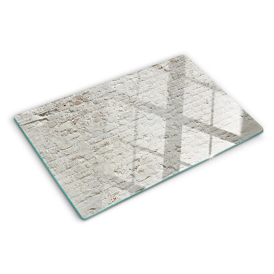 Glass chopping board Brick wall in loft style