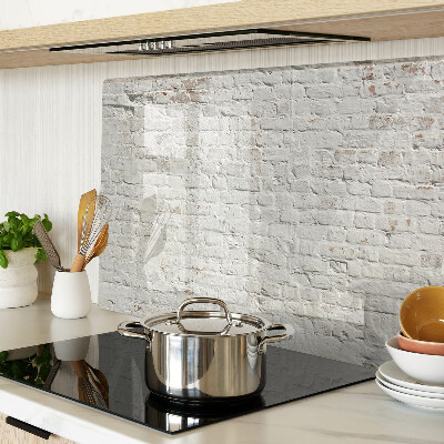 Glass chopping board Brick wall in loft style