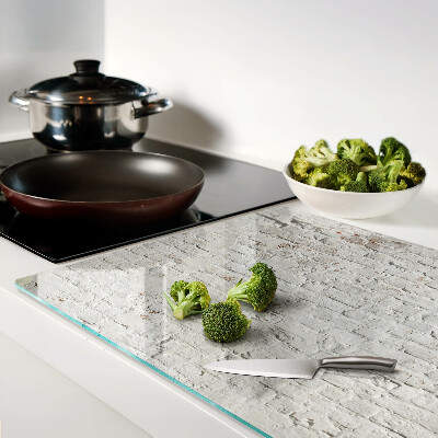 Glass chopping board Brick wall in loft style