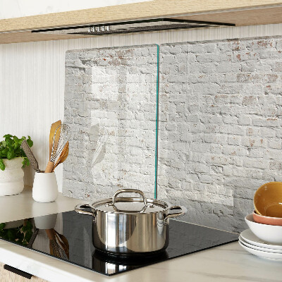Glass chopping board Brick wall in loft style