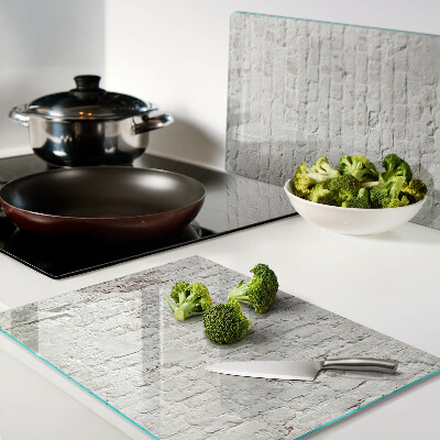 Glass chopping board Brick wall in loft style