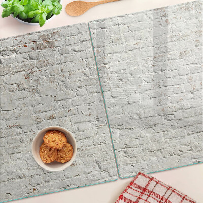 Glass chopping board Brick wall in loft style