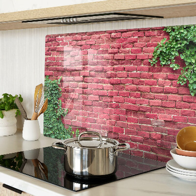 Glass chopping board Brick wall with vegetation