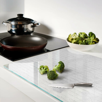 Glass chopping board White floorboards
