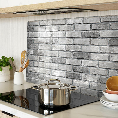 Glass kitchen board Brick wall in shades of gray