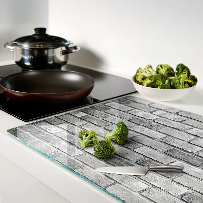 Glass kitchen board Brick wall in shades of gray
