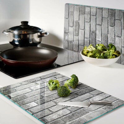 Glass kitchen board Brick wall in shades of gray