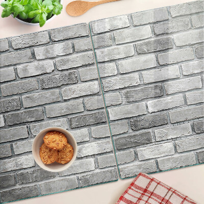 Glass kitchen board Brick wall in shades of gray