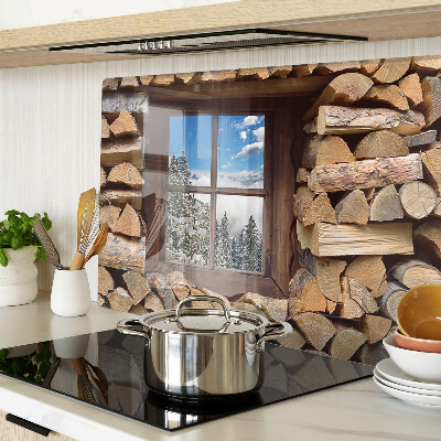 Chopping board glass View of a winter landscape through the window