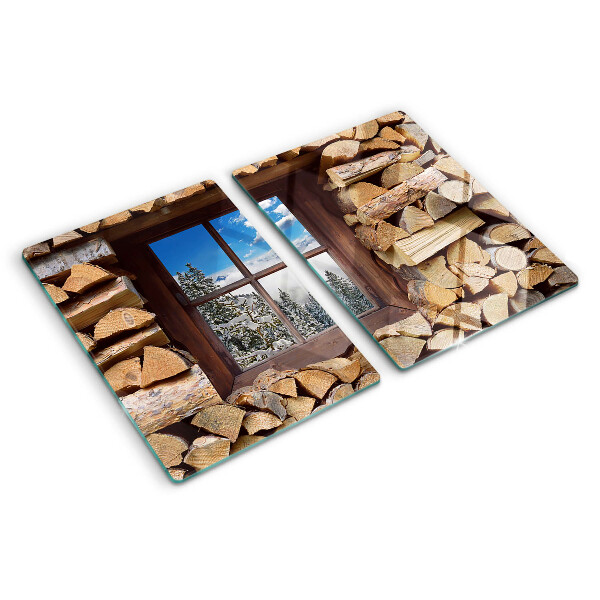 Chopping board glass View of a winter landscape through the window