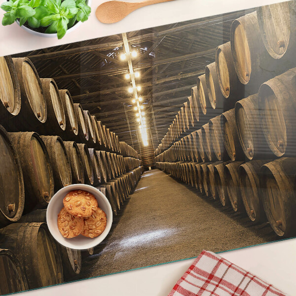 Chopping board glass Interior of a winery with barrels