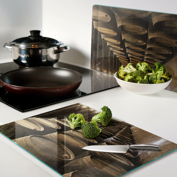 Chopping board glass Interior of a winery with barrels