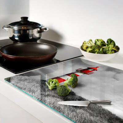 Cutting board A lighthouse in the landscape