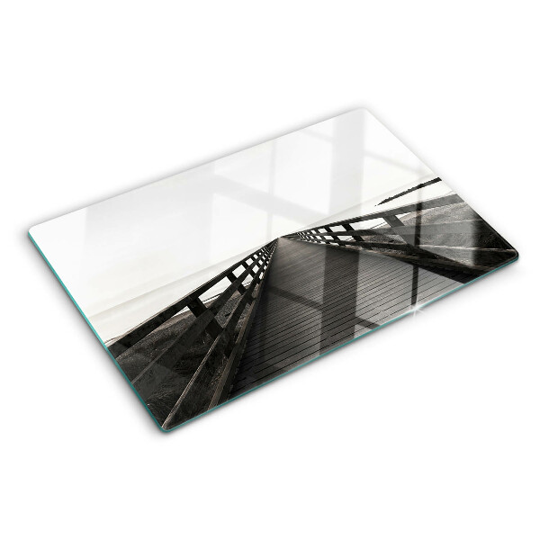 Glass kitchen board Wooden bridge over the water