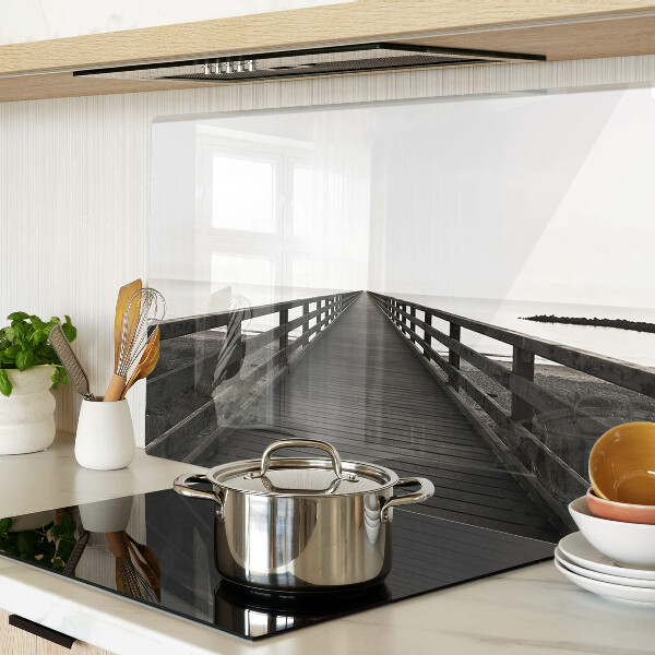 Glass kitchen board Wooden bridge over the water
