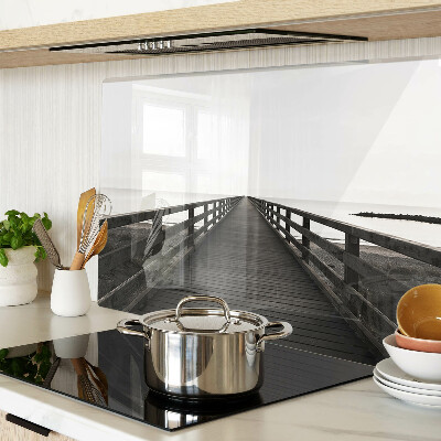 Glass kitchen board Wooden bridge over the water