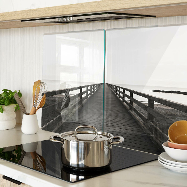 Glass kitchen board Wooden bridge over the water
