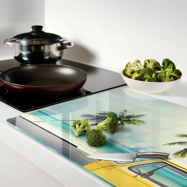 Glass cutting board Beach with palm trees and a car