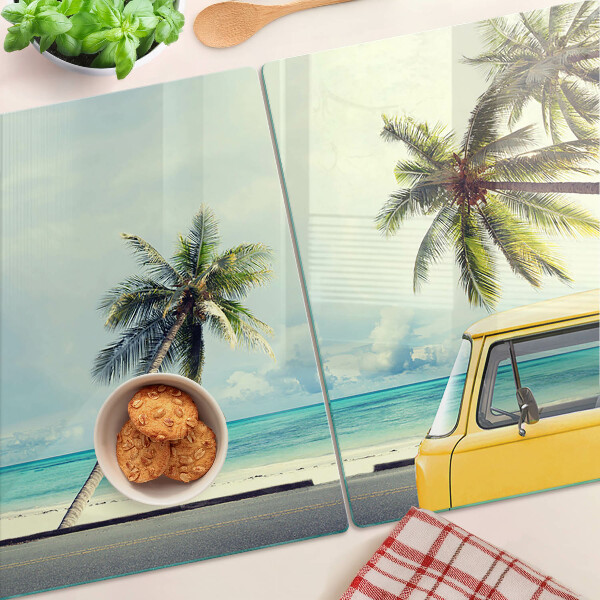 Glass cutting board Beach with palm trees and a car