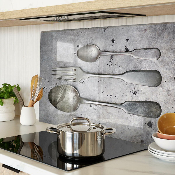 Chopping board Cutlery on a concrete background