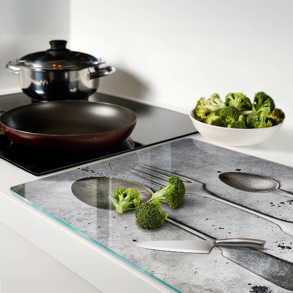 Chopping board Cutlery on a concrete background