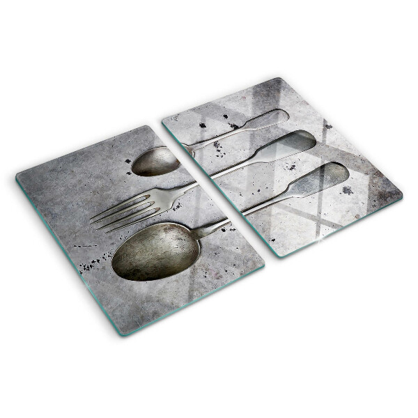 Chopping board Cutlery on a concrete background