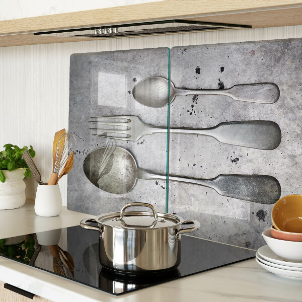 Chopping board Cutlery on a concrete background