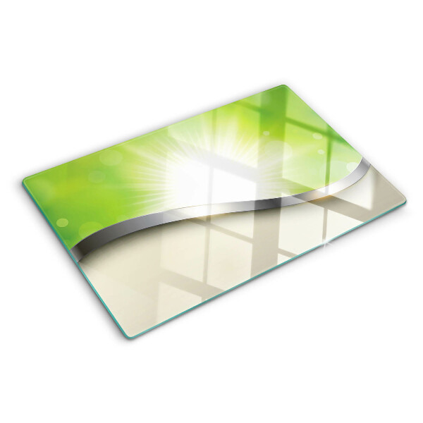 Chopping board glass Green bokeh with rays of light