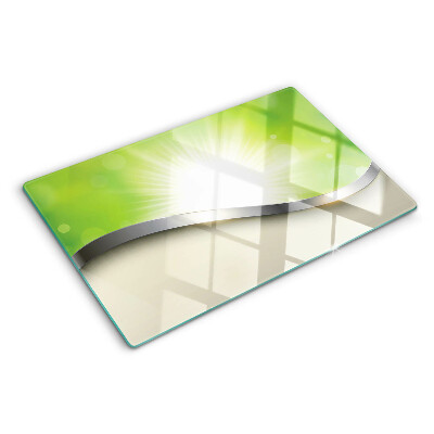 Chopping board glass Green bokeh with rays of light
