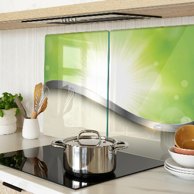 Chopping board glass Green bokeh with rays of light