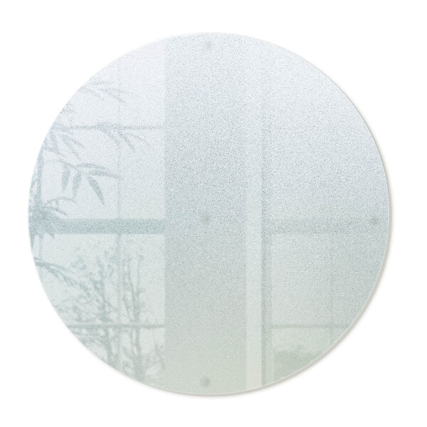 Glass cutting board with a round semi-transparent design