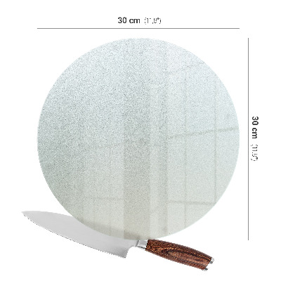 Glass cutting board with a round semi-transparent design