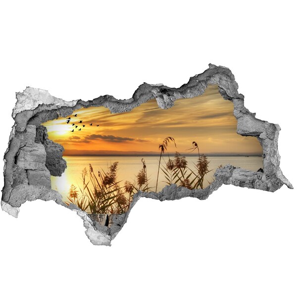 Hole wall sticker Sunset over the lake