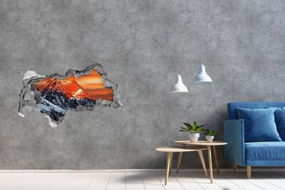 Hole in the wall sticker Mountains in the setting sun