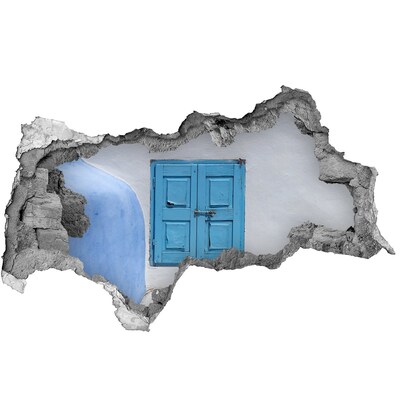 Hole in the wall sticker A broken wall with a blue door