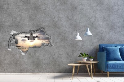 Hole in the wall sticker Flight into the setting sun
