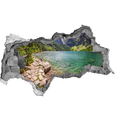 Hole wall sticker Mountain lake in the valley