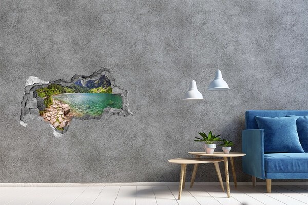 Hole wall sticker Mountain lake in the valley