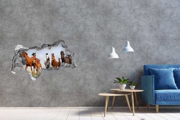 Hole wall sticker Galloping horses in the meadow