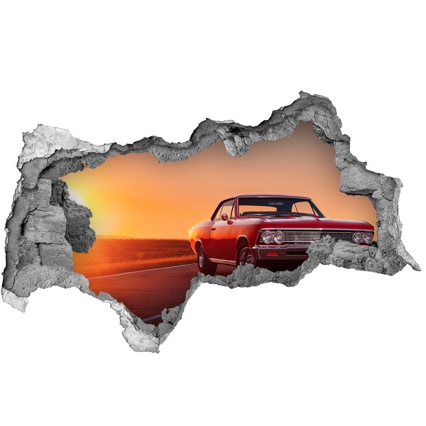 Hole in the wall sticker Classic car against the backdrop of a sunset