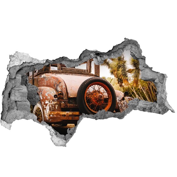 Hole in the wall decal Rusty car in a desert landscape