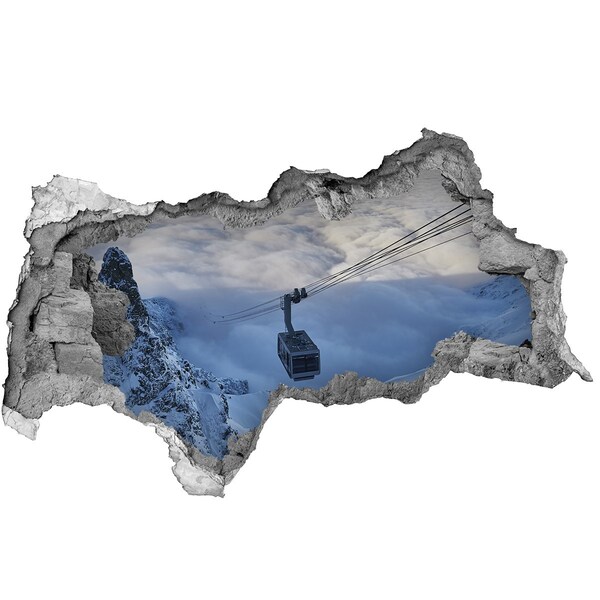 Hole wall sticker Mountain cable car above the clouds
