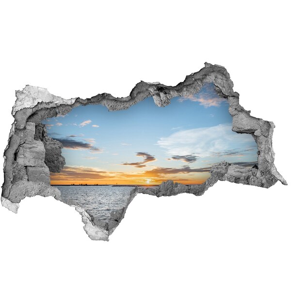 Hole wall sticker Sunset over the sea