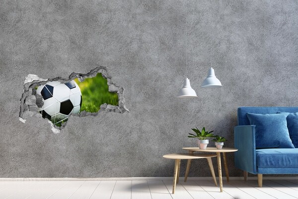 Hole wall sticker Football on the pitch