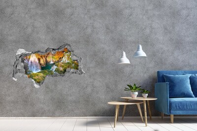 Hole in the wall sticker Waterfalls in the autumn scenery