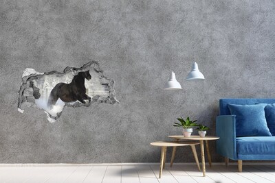Hole in the wall sticker A galloping horse in a winter landscape